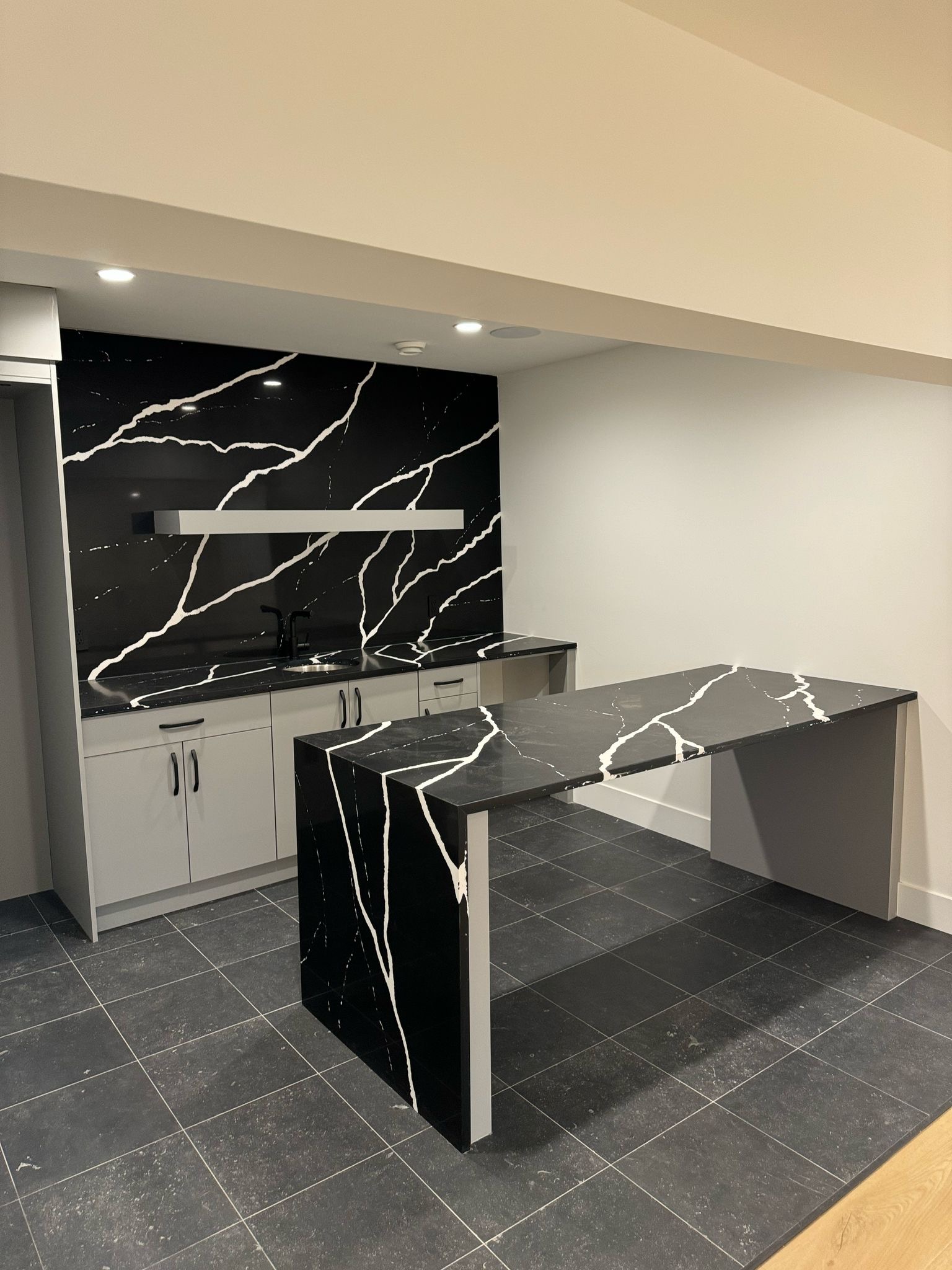 Diamond Granite & Quartz Corp project — black marble bar